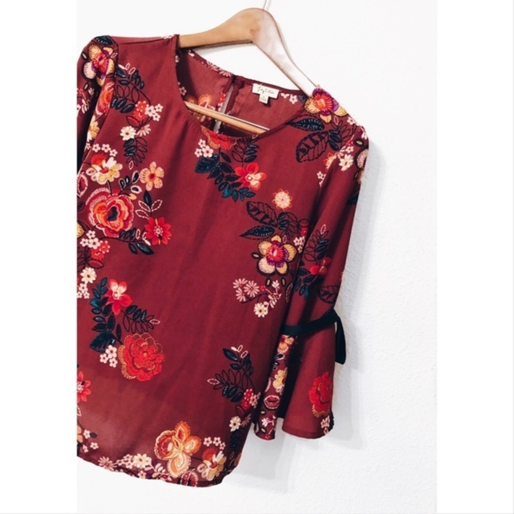 Lily White floral ribbon tied bell sleeved top